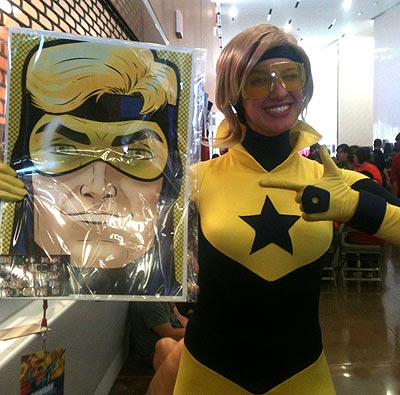Nicole as Booster Gold