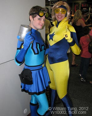 RaeHimura as Blue Beetle, Demyrie as Booster Gold by William Tung